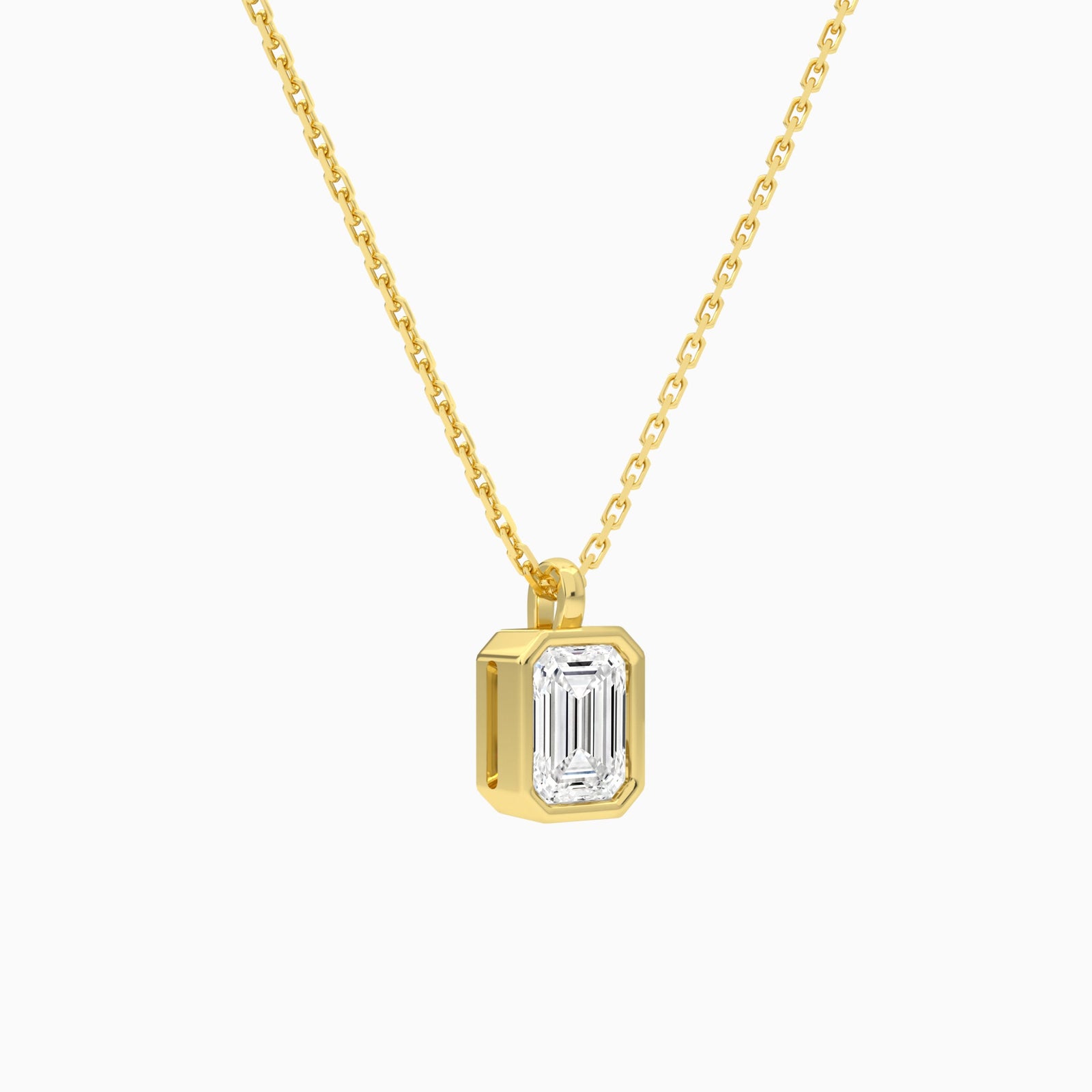 Bezel Solitaire Emerald Lab Grown Diamond Pendant Necklace In 18K Yellow Gold - Front Angle View