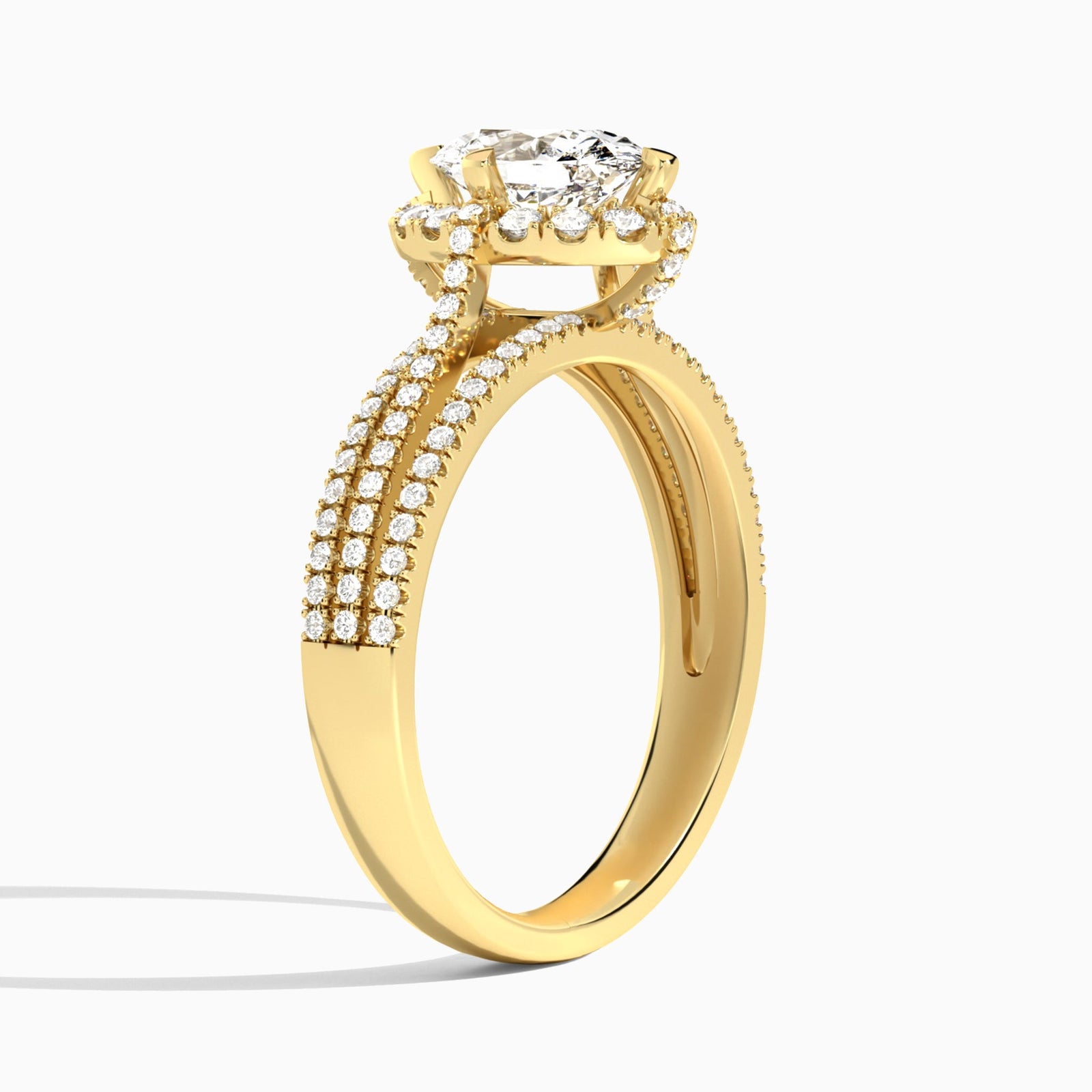 Oval Split Shank Halo Lab Grown Diamond Engagement Ring In 18K Yellow Gold, Angle View