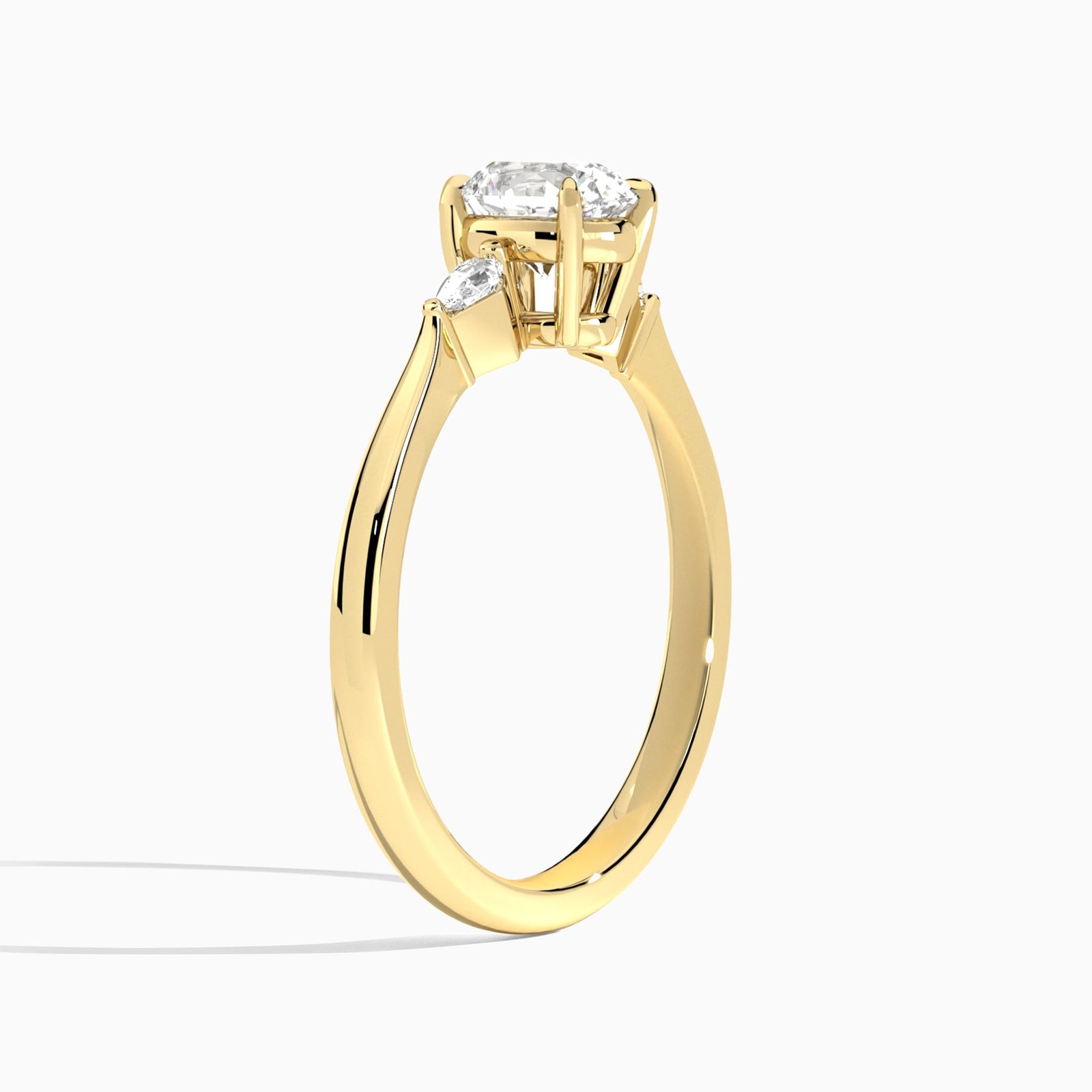 Round Three Stone Lab Diamond Engagement Ring In 18K Yellow Gold, Angle View