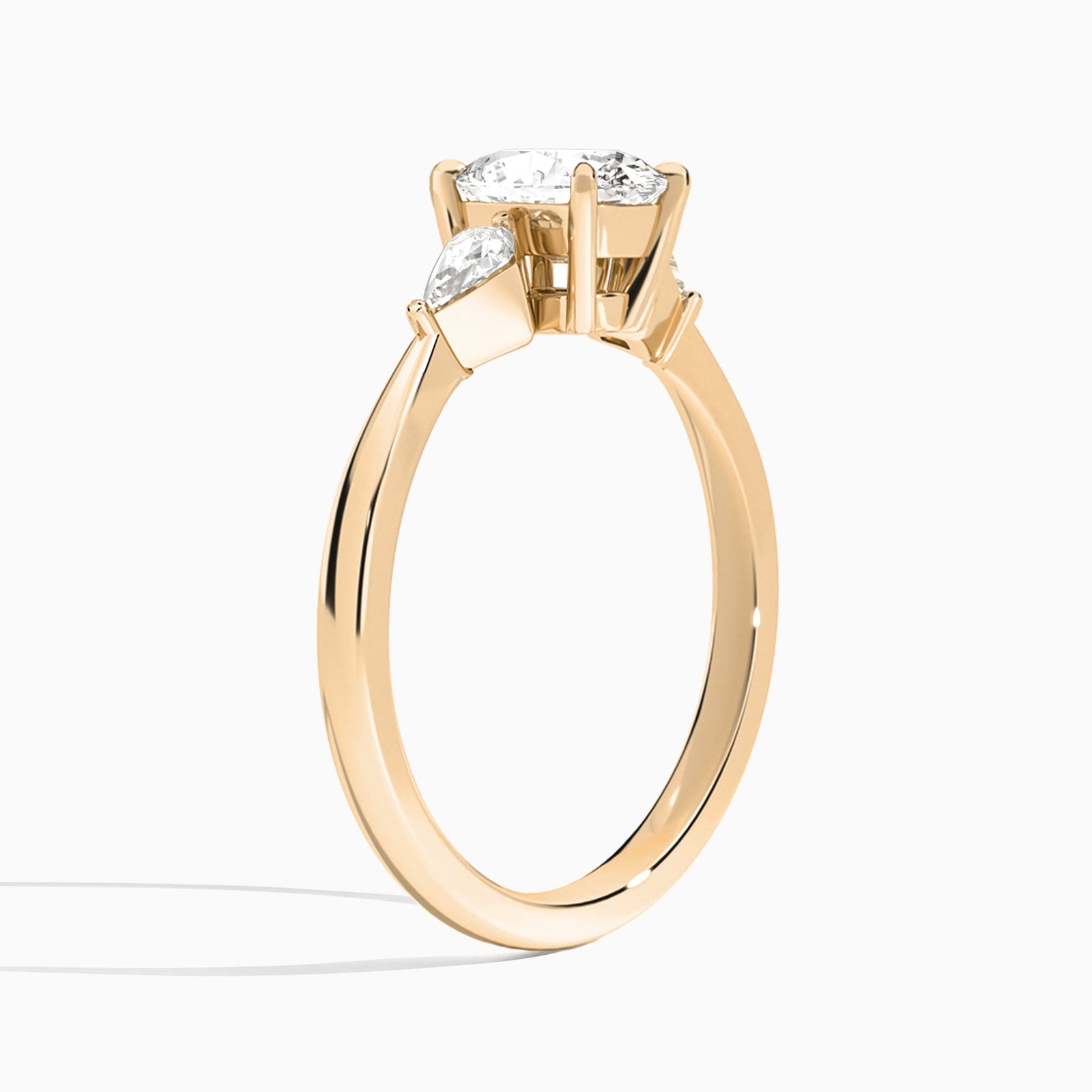 Oval Luxe Ciana Three Stone Lab Diamond Engagement Ring In 14K Rose Gold, Angle View