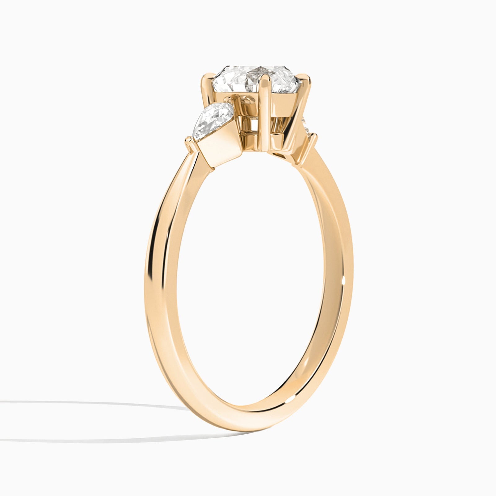 Round Luxe Ciana Three Stone Lab Diamond Engagement Ring In 14K Rose Gold, Angle View