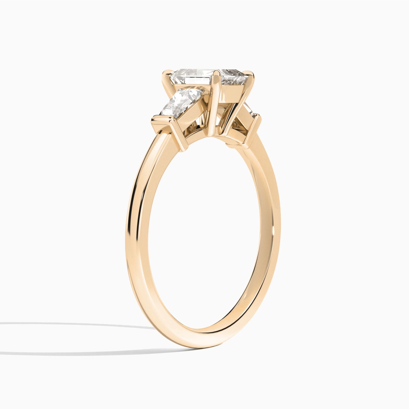 Emerald Thora Three Stone Lab Diamond Engagement Ring In 14K Rose Gold, Angle View