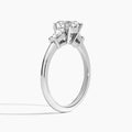 Round Thora Three Stone Lab Diamond Engagement Ring In 18K White Gold, Angle View