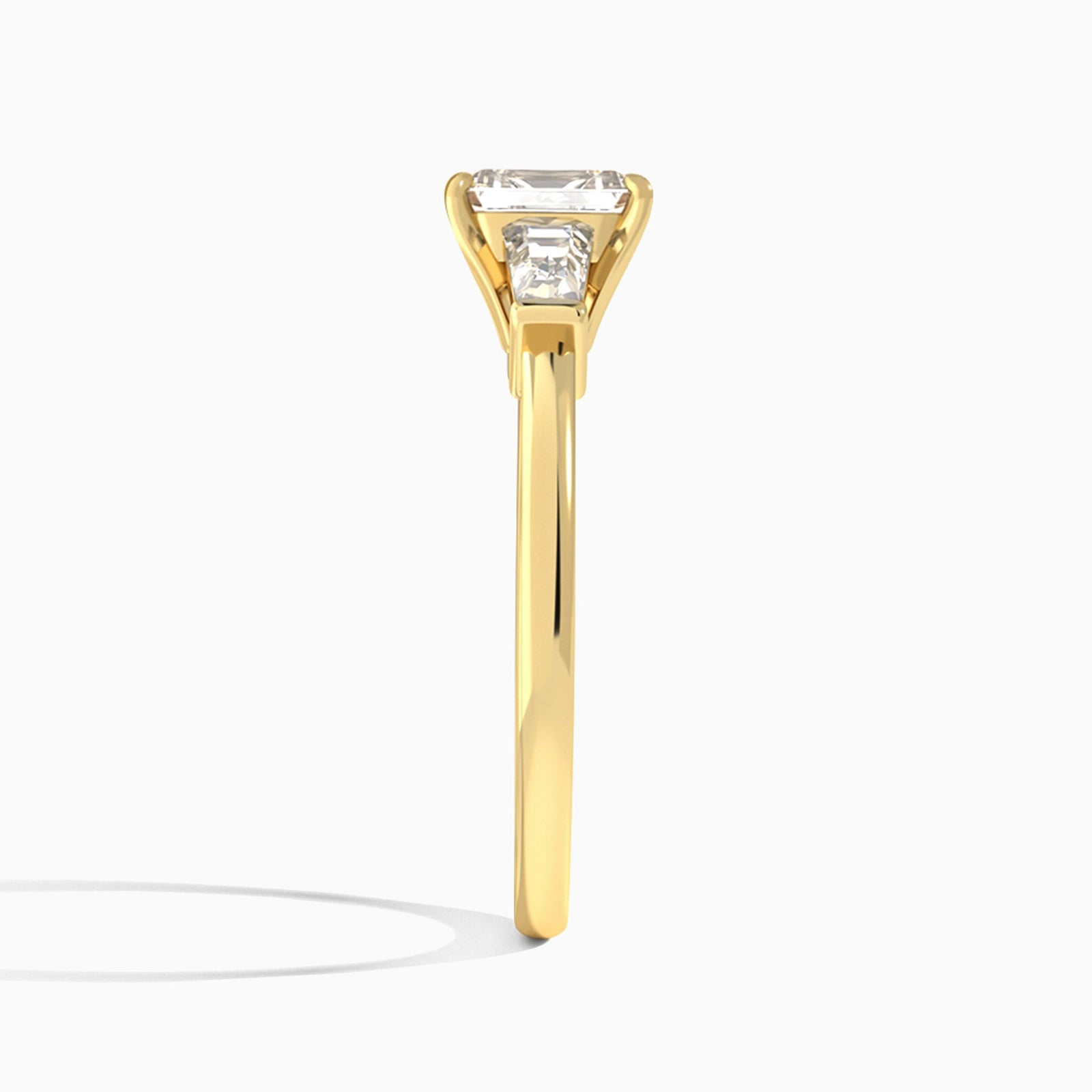Emerald Thora Three Stone Lab Diamond Engagement Ring In 14K Yellow Gold, Side View