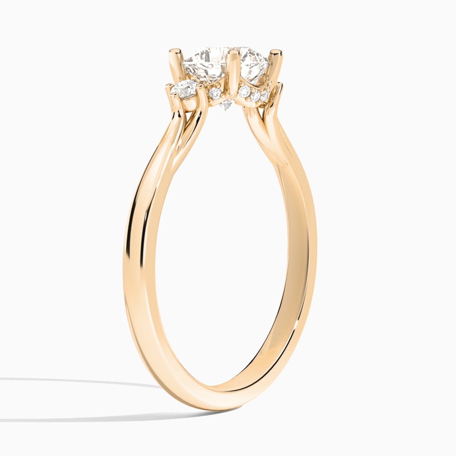 Cushion Floating Three Stone Lab Diamond Engagement Ring In 14K Rose Gold, Angle View