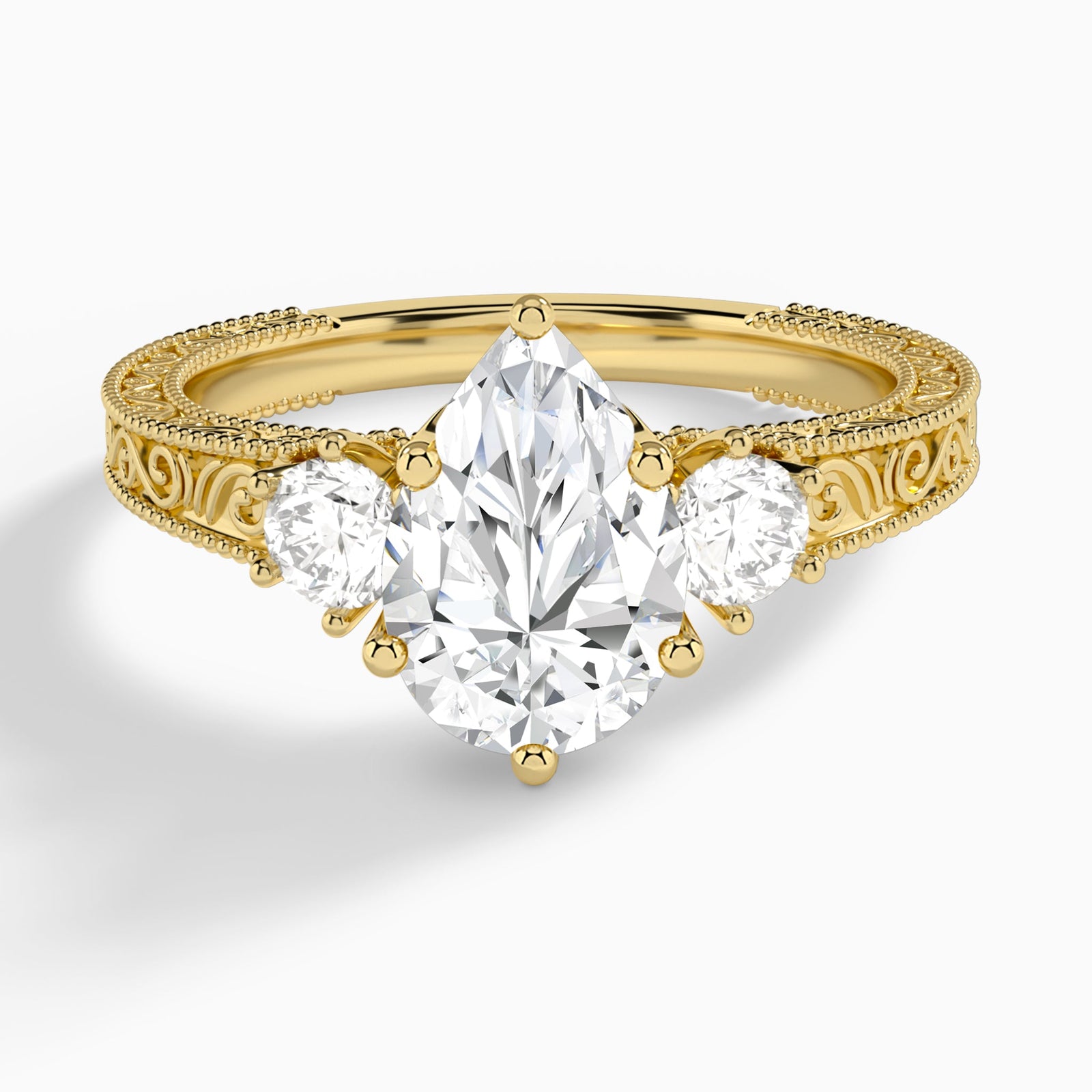 Pear Three Stone Engraved Lab Diamond Engagement Ring In 14K Yellow Gold - Lucenjuri