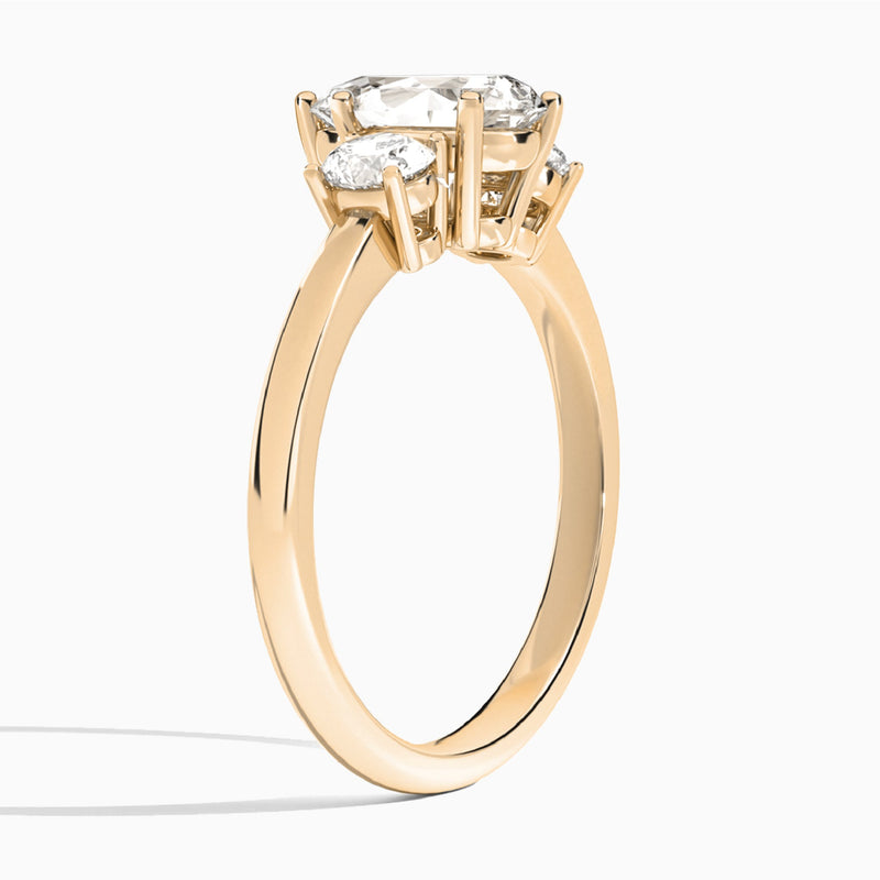 Pear Sonata Three Stone Lab Diamond Engagement Ring In 14K Rose Gold, Angle View