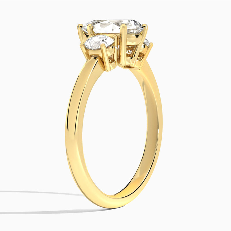 Pear Sonata Three Stone Lab Diamond Engagement Ring In 14K Yellow Gold, Angle View