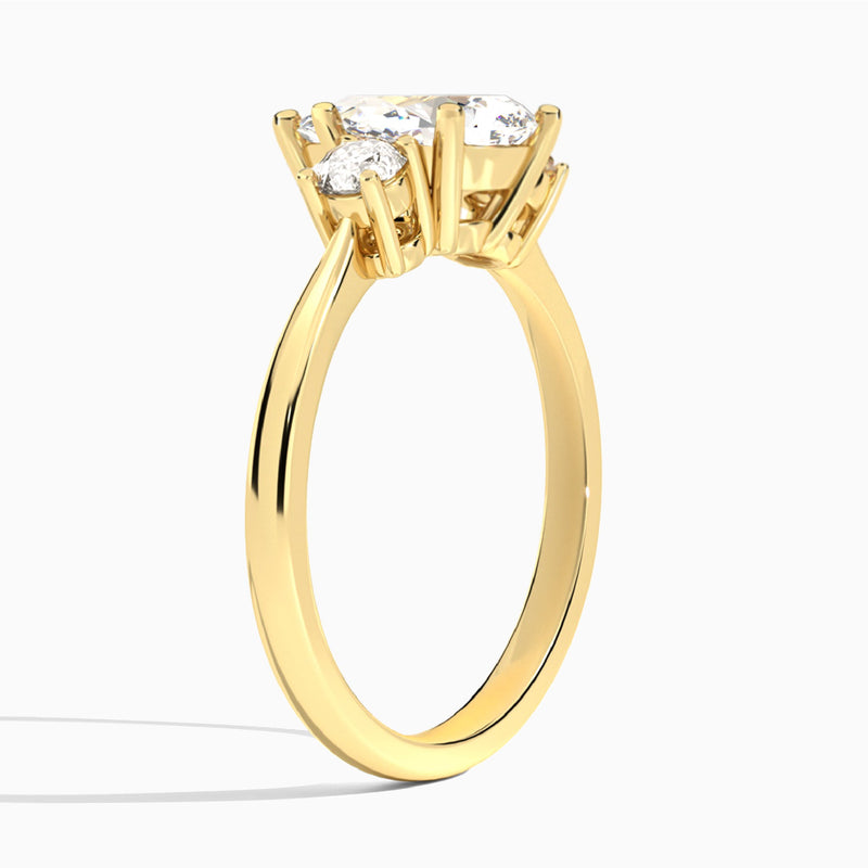 Pear Concerto Three Stone Lab Diamond Engagement Ring In 18K Yellow Gold, Angle View