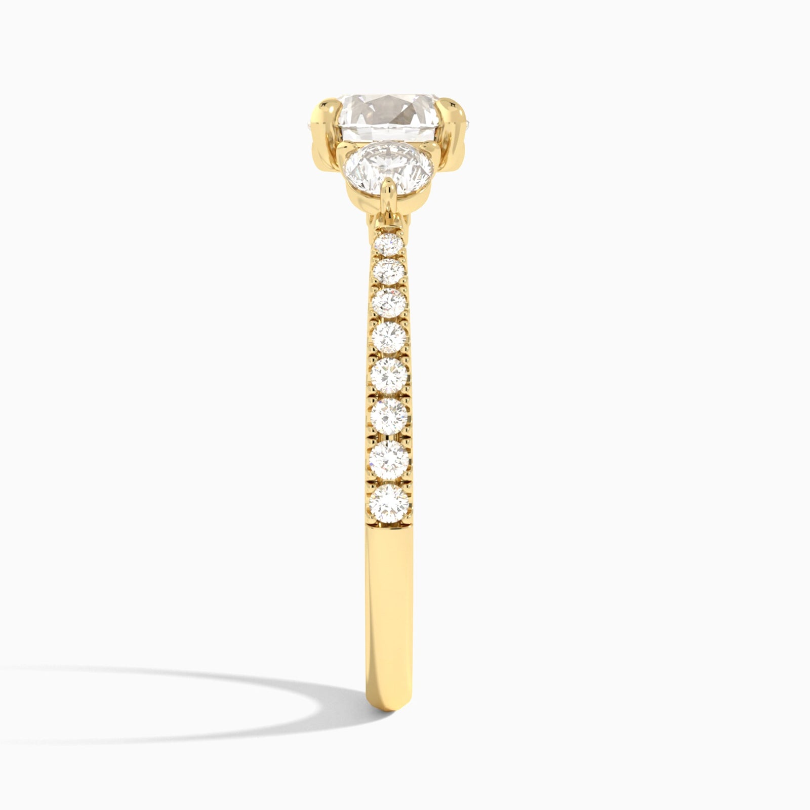 Round Luxe Three Stone Pavé Lab Diamond Engagement Ring In 18K Yellow Gold, Side View