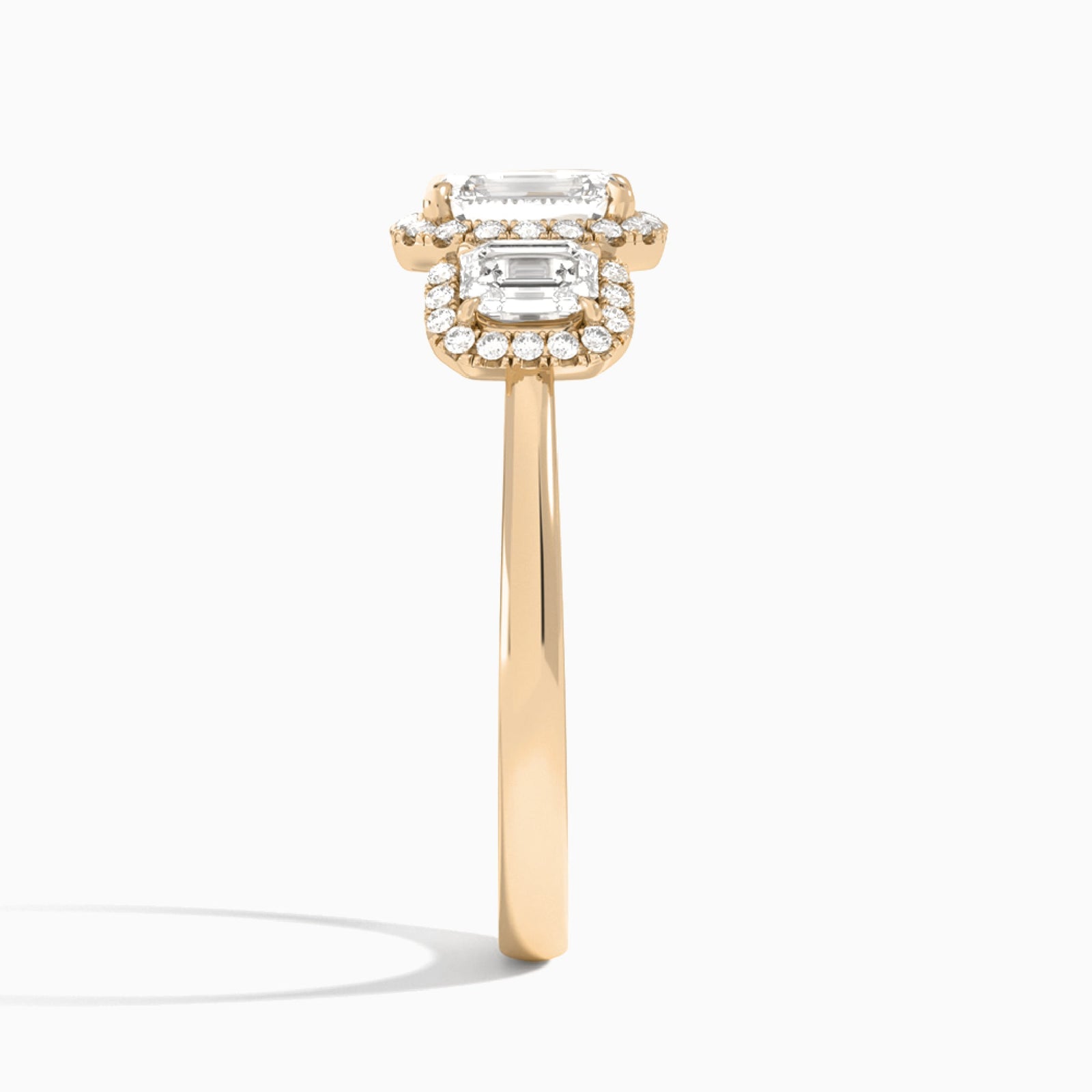 Emerald Luxe Three Stone Halo Lab Diamond Engagement Ring In 14K Rose Gold, Side View