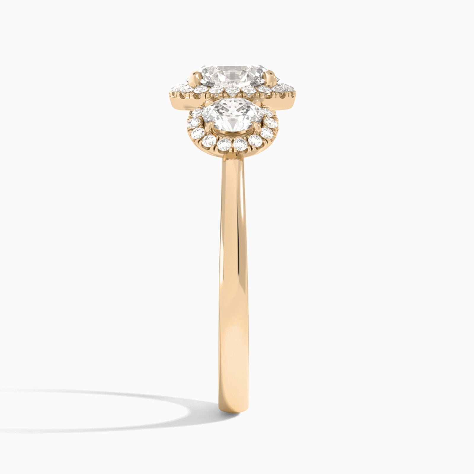 Oval Luxe Three Stone Halo Lab Diamond Engagement Ring In 14K Rose Gold, Side View