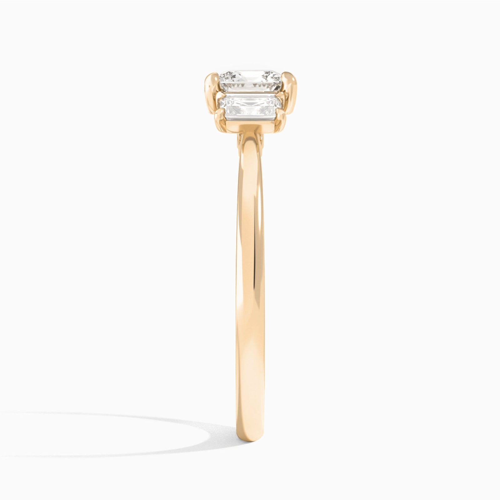 Cushion Three Stone Emerald Lab Diamond Engagement Ring In 14K Rose Gold, Side View