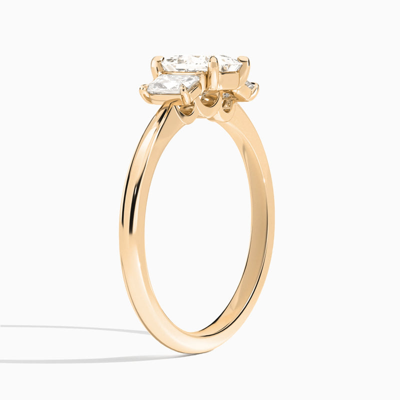Princess Three Stone Emerald Lab Diamond Engagement Ring In 14K Rose Gold, Angle View