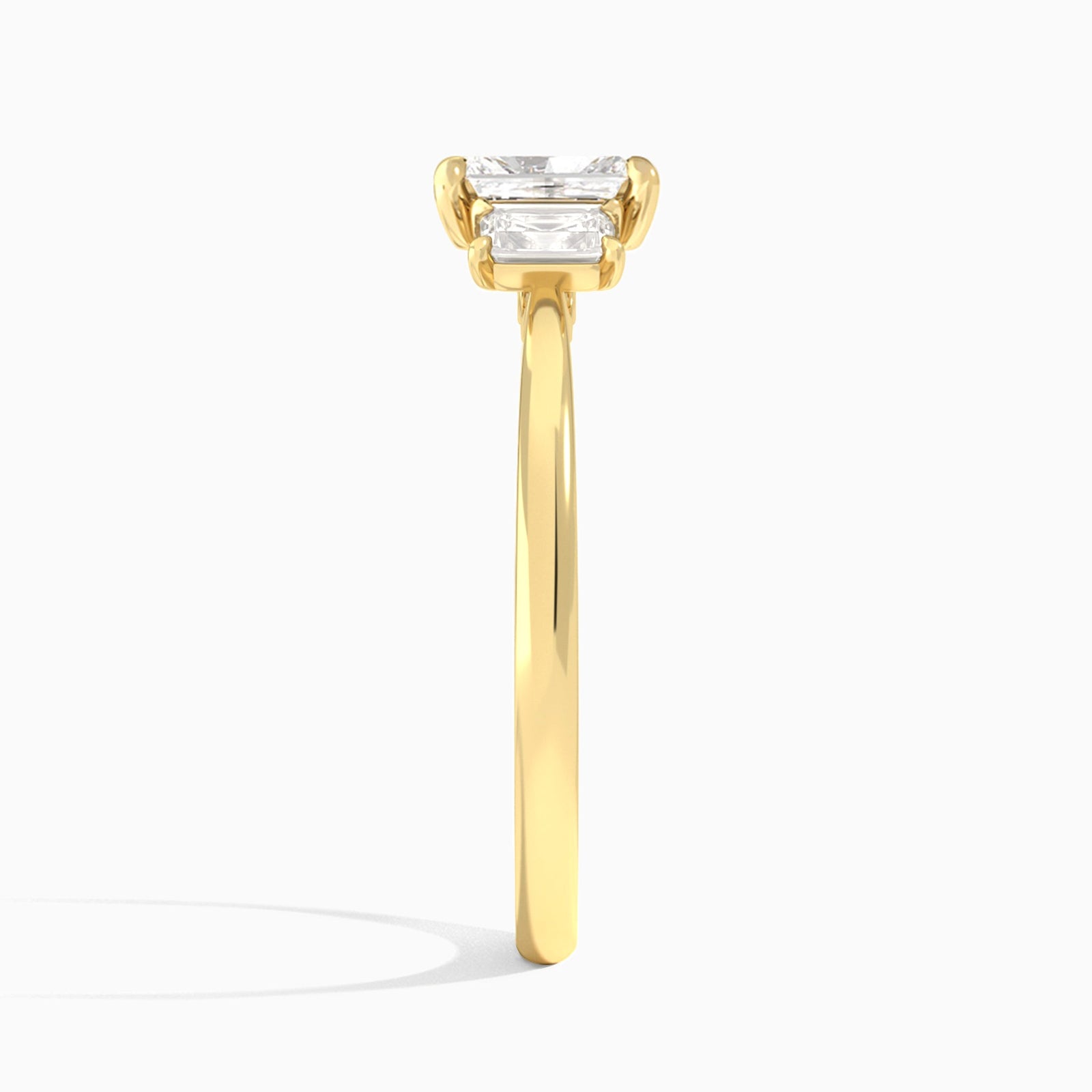 Radiant Three Stone Emerald Lab Diamond Engagement Ring In 18K Yellow Gold, Side View