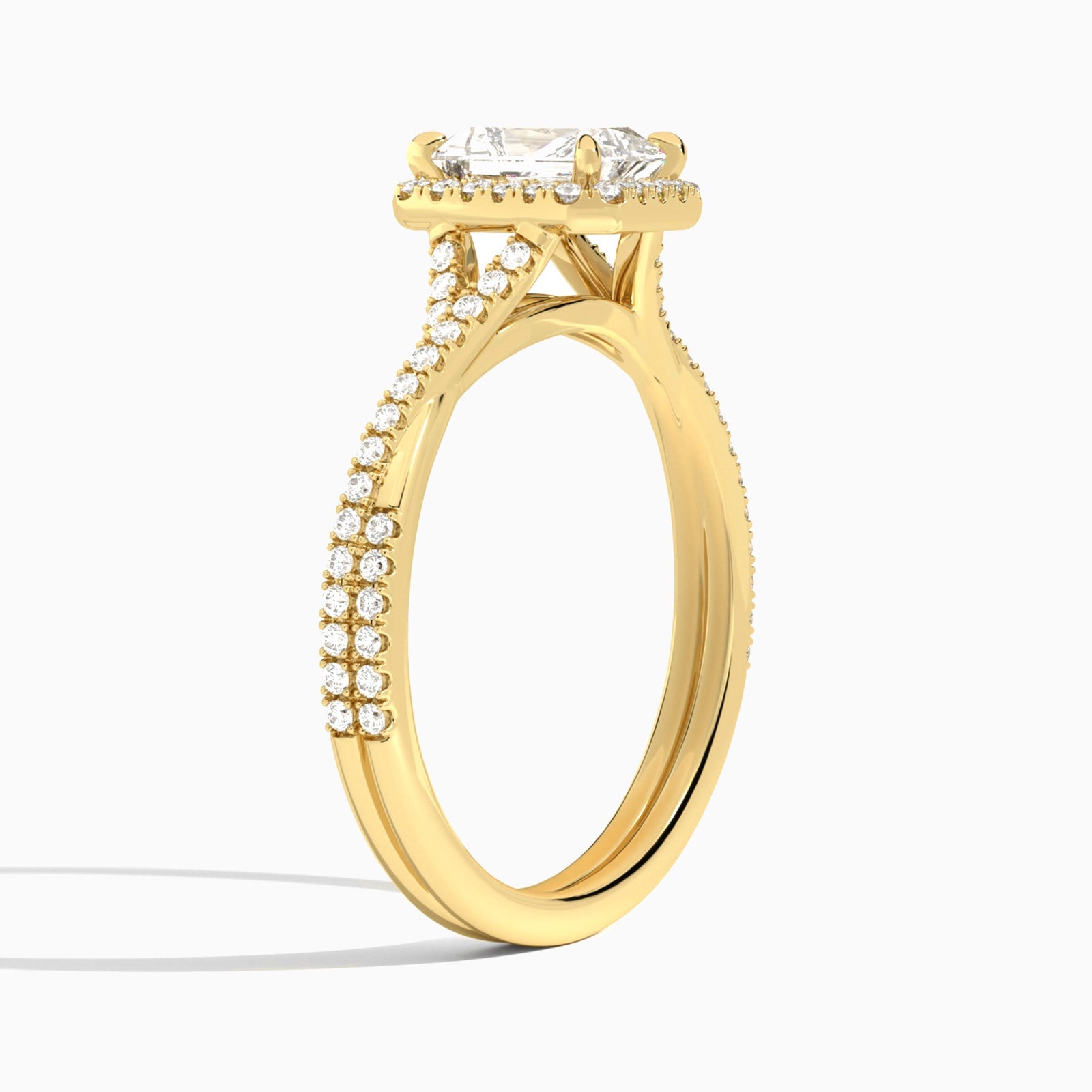 Radiant Luxe Halo And Twisted Shank Lab Diamond Engagement Ring In 14K Yellow Gold, Angle View