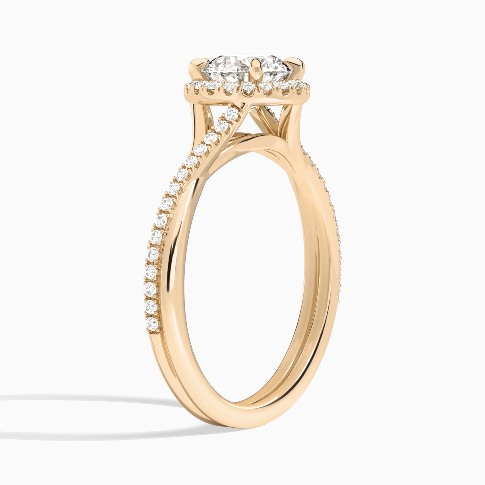 Round Halo Twisted Shank Lab Diamond Engagement Ring In 14K Rose Gold, Angle View