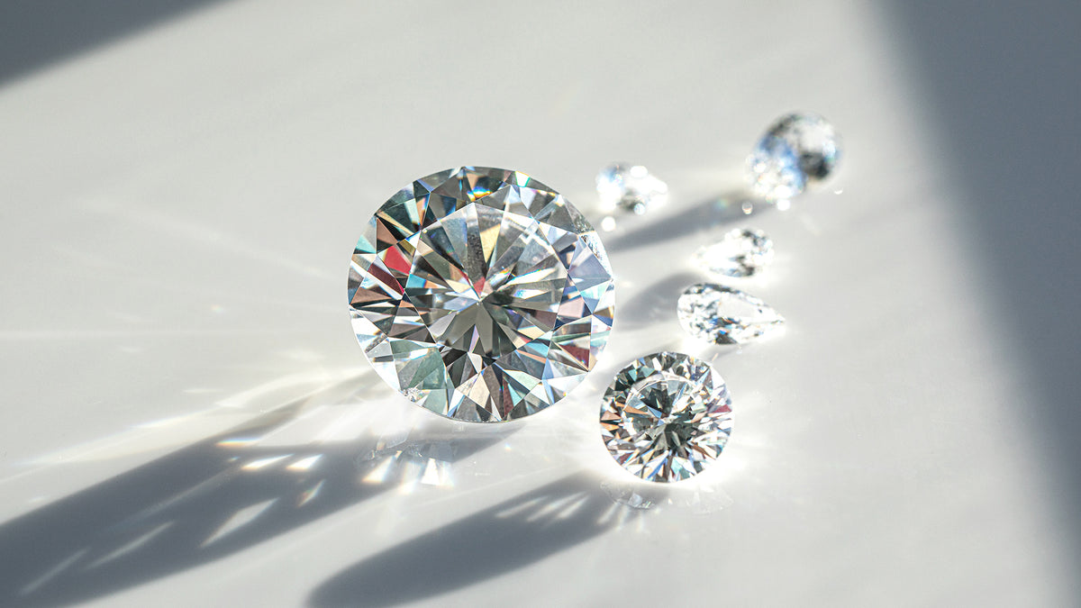 Close-up of round lab grown diamonds on a light background