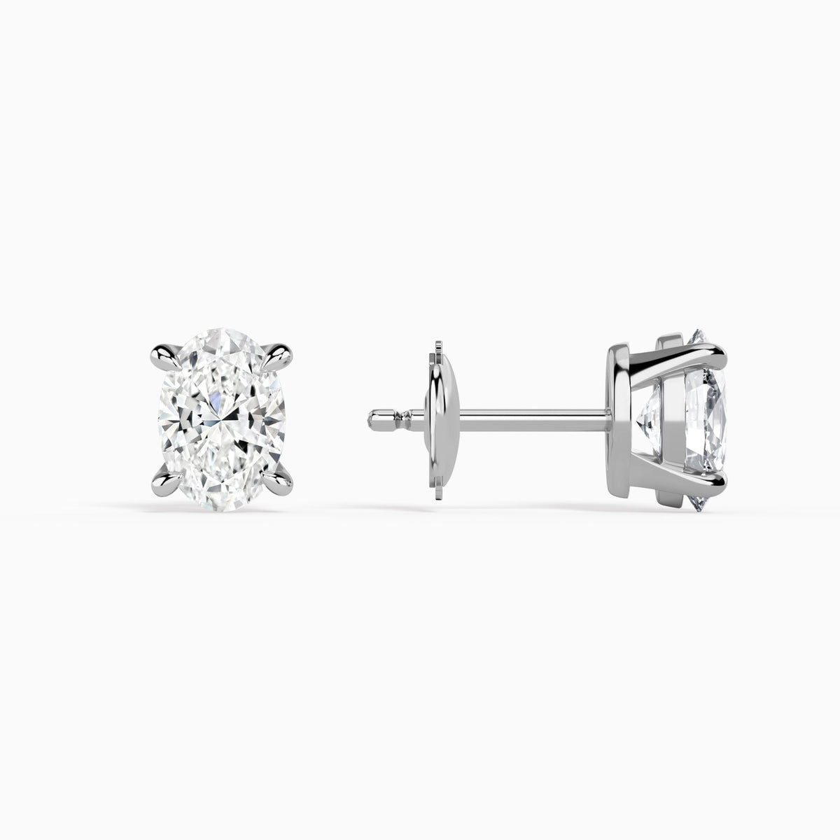 Oval Solitaire 4-Prong Diamond Stud Earrings in Platinum