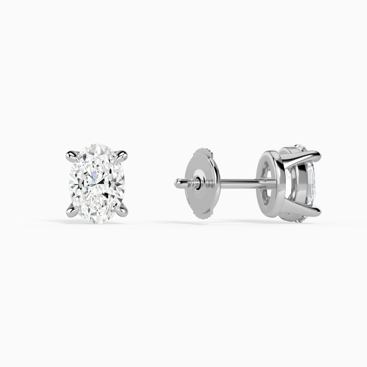 Oval Solitaire 4-Prong Diamond Stud Earrings in Platinum
