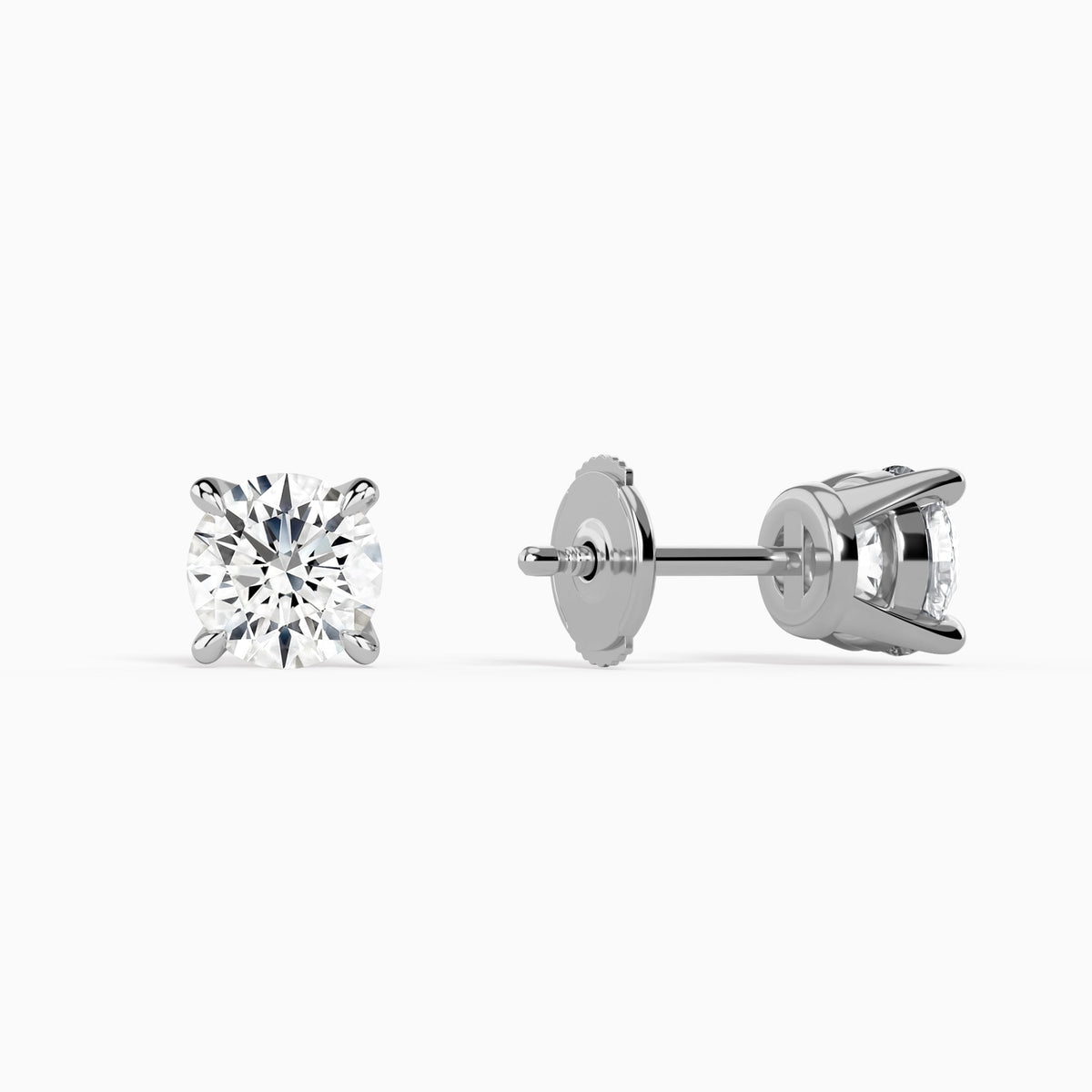 Round Solitaire 4-Prong Diamond Stud Earrings in Platinum