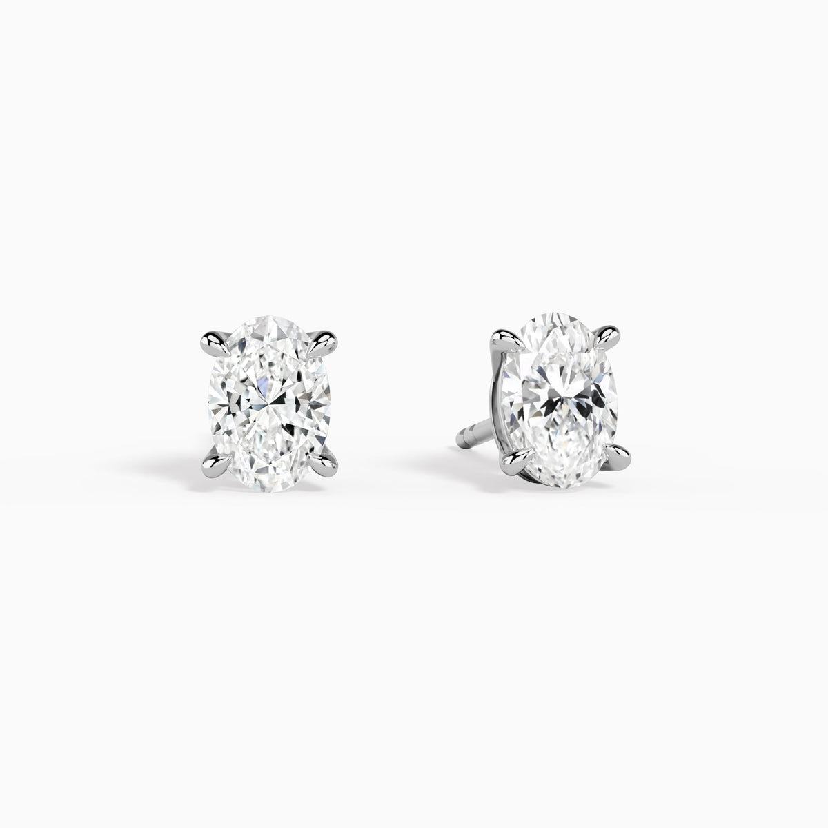 Oval Solitaire 4-Prong Diamond Stud Earrings in 14K White Gold