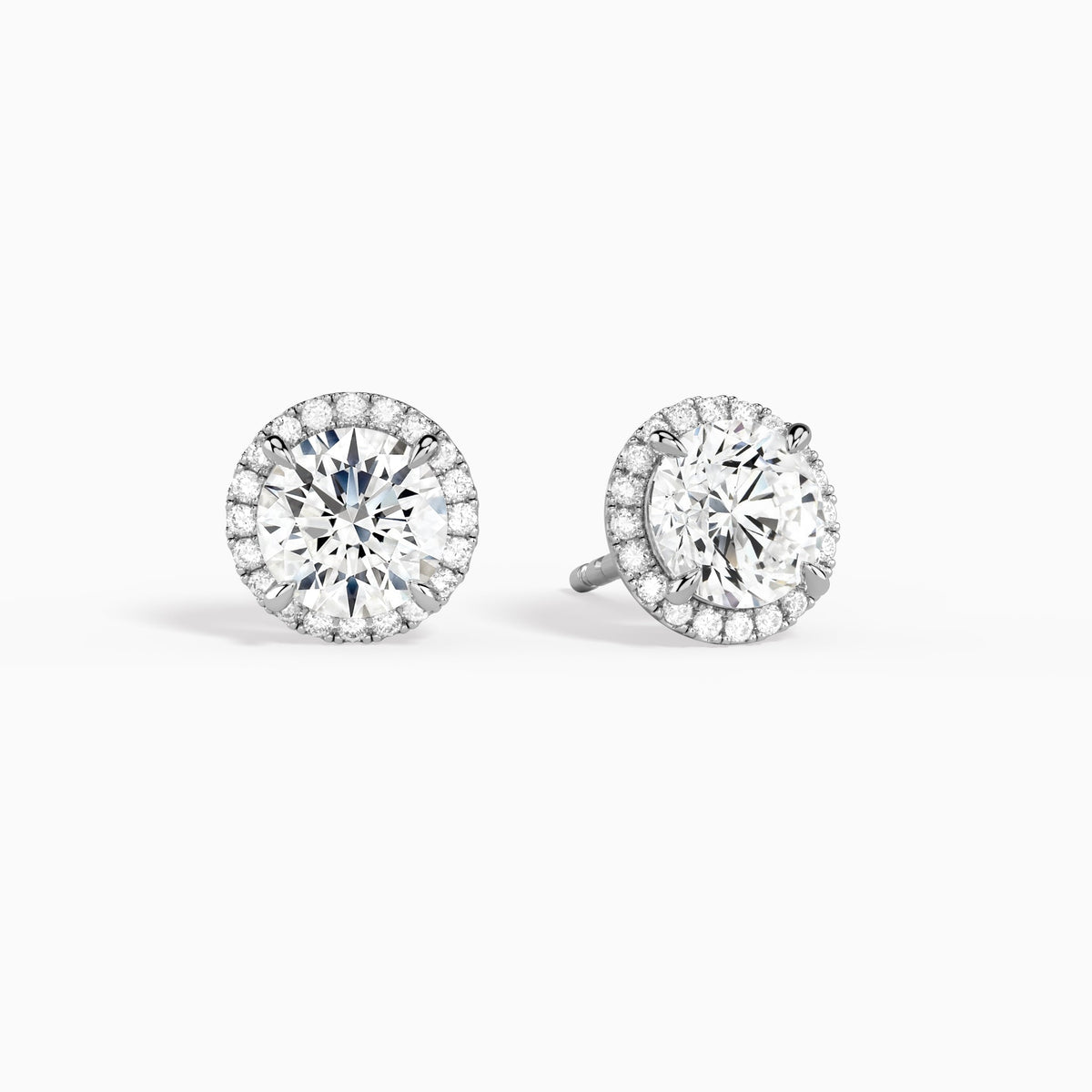 Round Halo Diamond Stud Earrings in Platinum