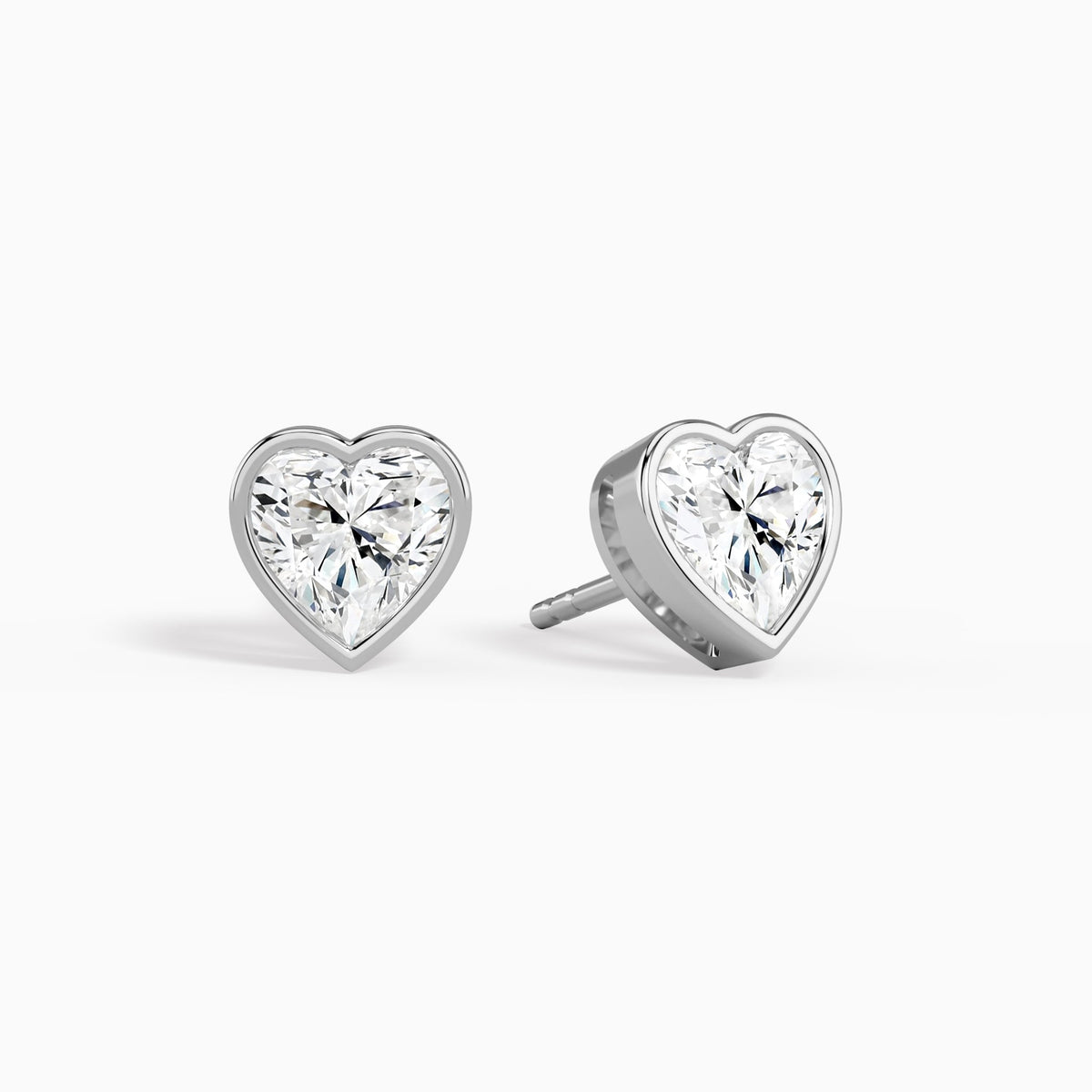 Heart Bezel Solitaire Diamond Stud Earrings in Platinum