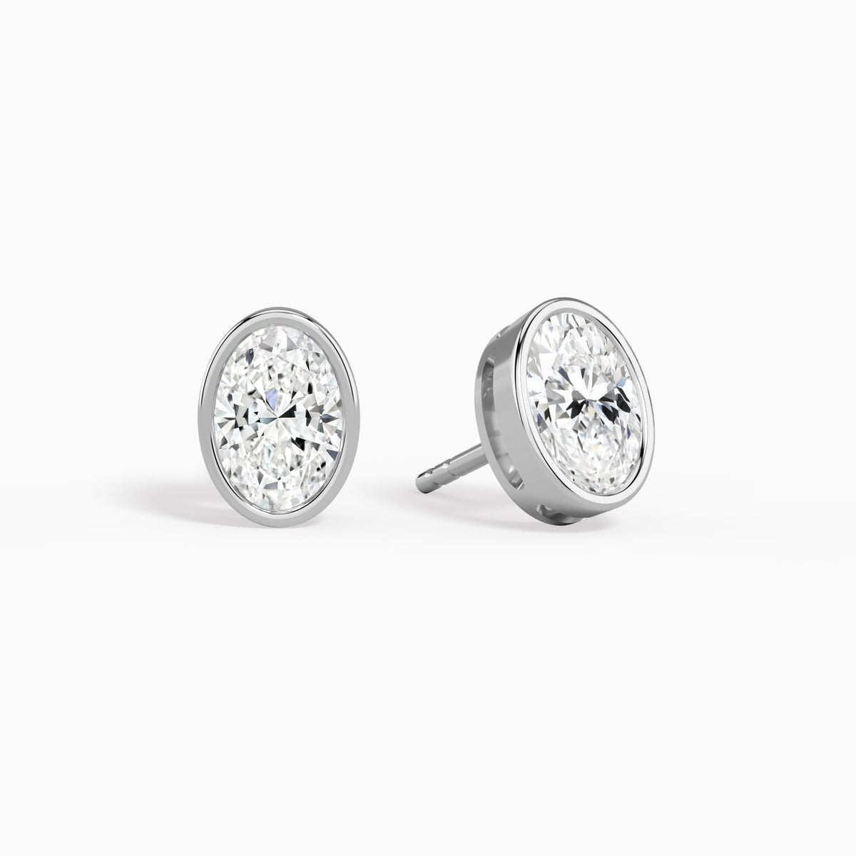 Oval Bezel Solitaire Diamond Stud Earrings in 14K White Gold