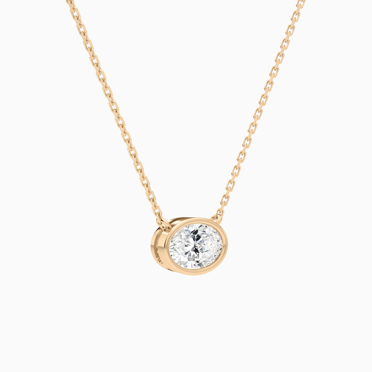 Bezel Solitaire Oval Lab Grown Diamond Necklace In 14K Rose Gold - Front Angle View