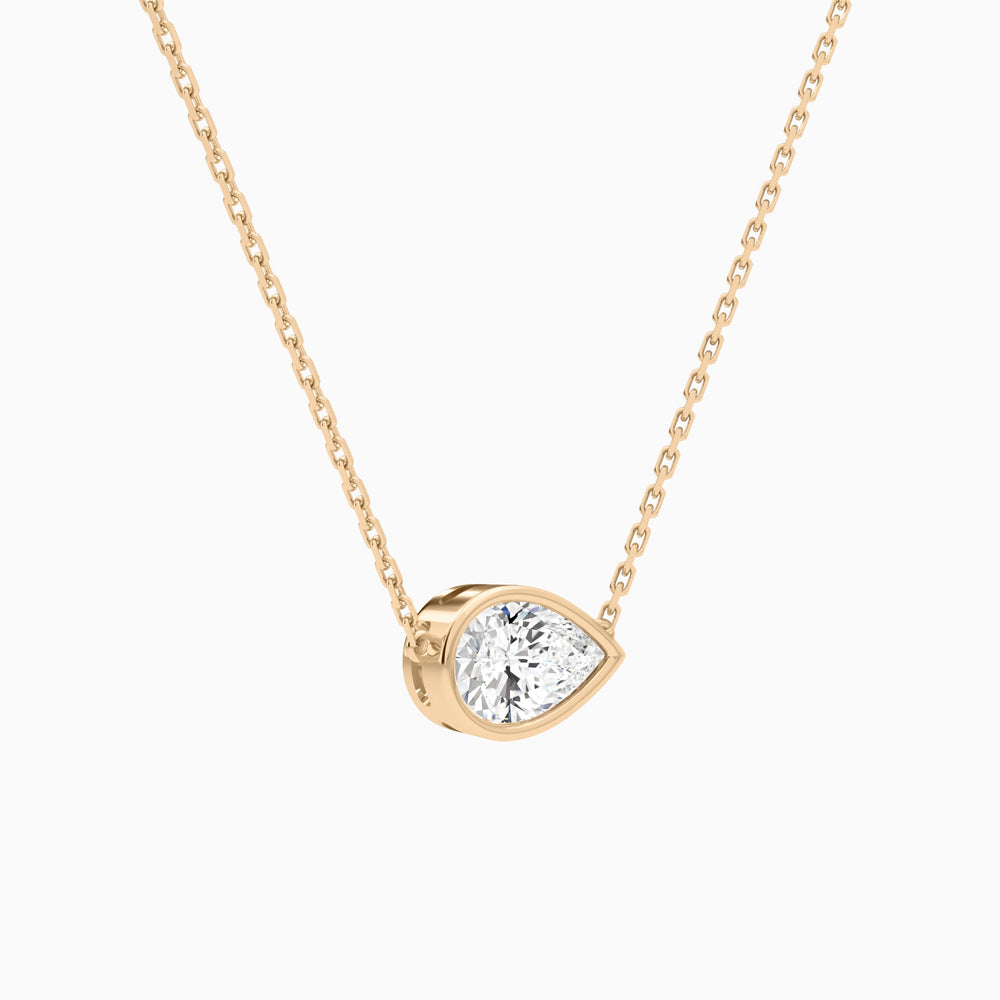 Bezel Solitaire Pear Lab Grown Diamond Necklace In 14K Rose Gold - Front Angle View