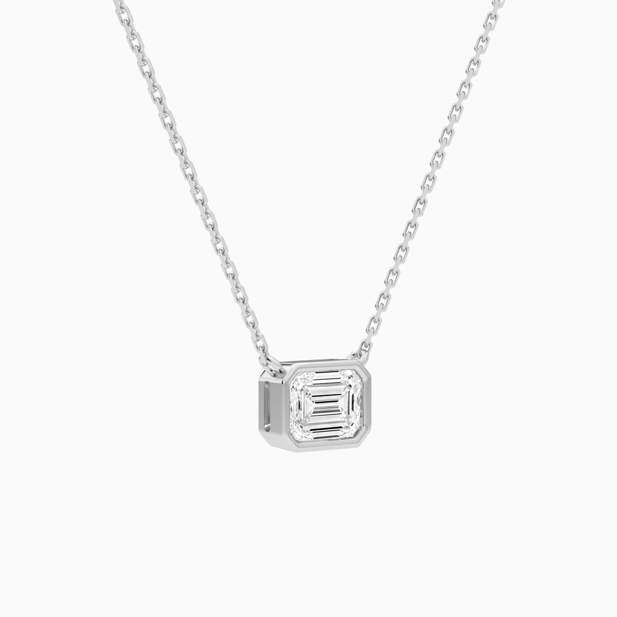 Bezel Solitaire Emerald Lab Grown Diamond Necklace In 18K White Gold - Front Angle View