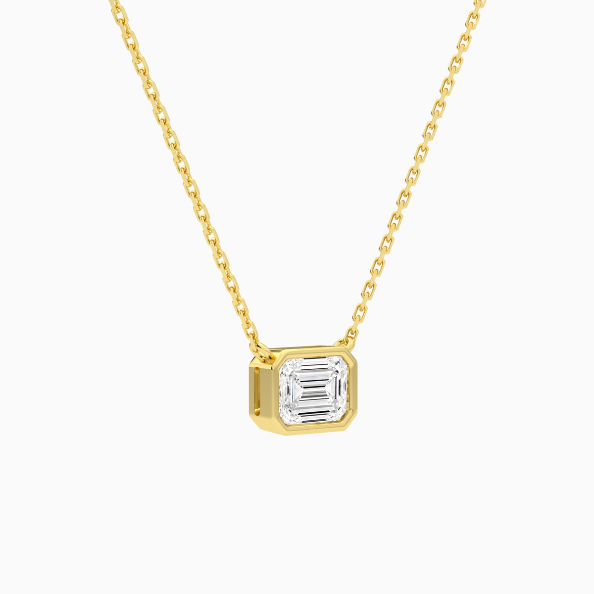 Bezel Solitaire Emerald Lab Grown Diamond Necklace In 14K Yellow Gold - Front Angle View