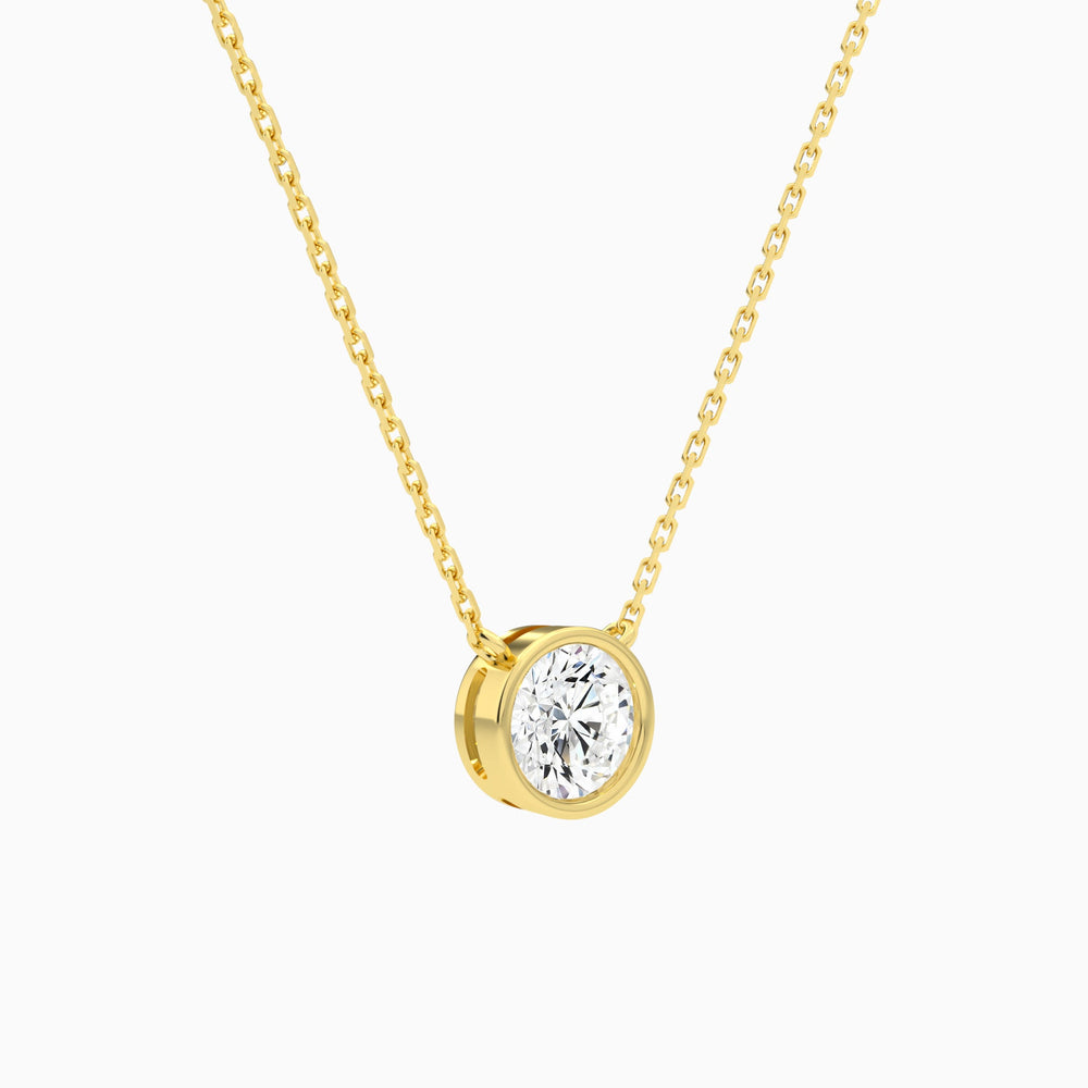 Bezel Solitaire Round Lab Grown Diamond Necklace In 14K Yellow Gold - Front Angle View