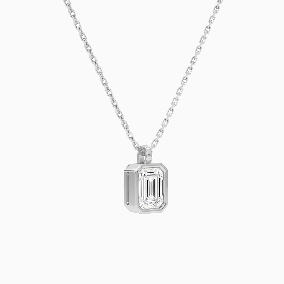 Bezel Solitaire Emerald Lab Grown Diamond Pendant Necklace In 18K White Gold - Front Angle View