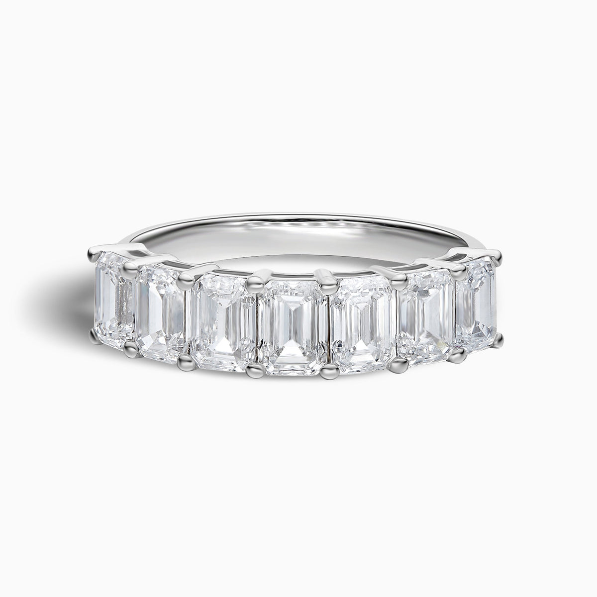 Emerald Half Eternity Band in Platinum