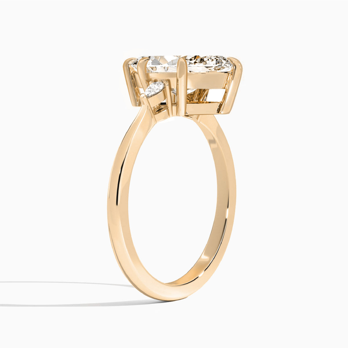 Marquise Dulcie Three Stone Lab Diamond Engagement Ring In 14K Rose Gold, Angle View