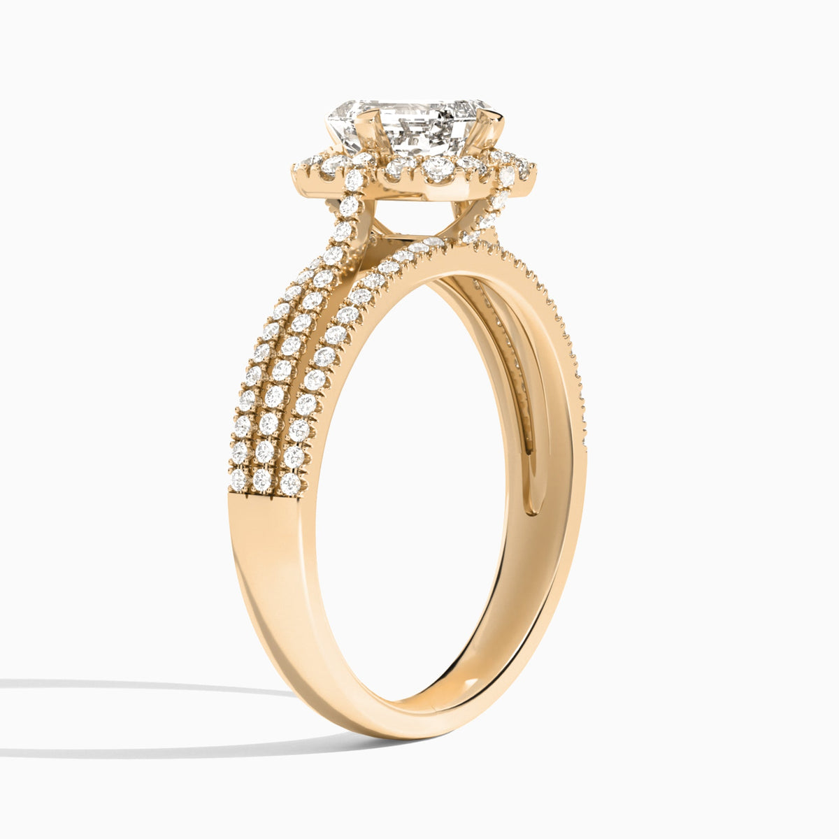 Emerald Split Shank Halo Lab Grown Diamond Engagement Ring In 14K Rose Gold, Angle View
