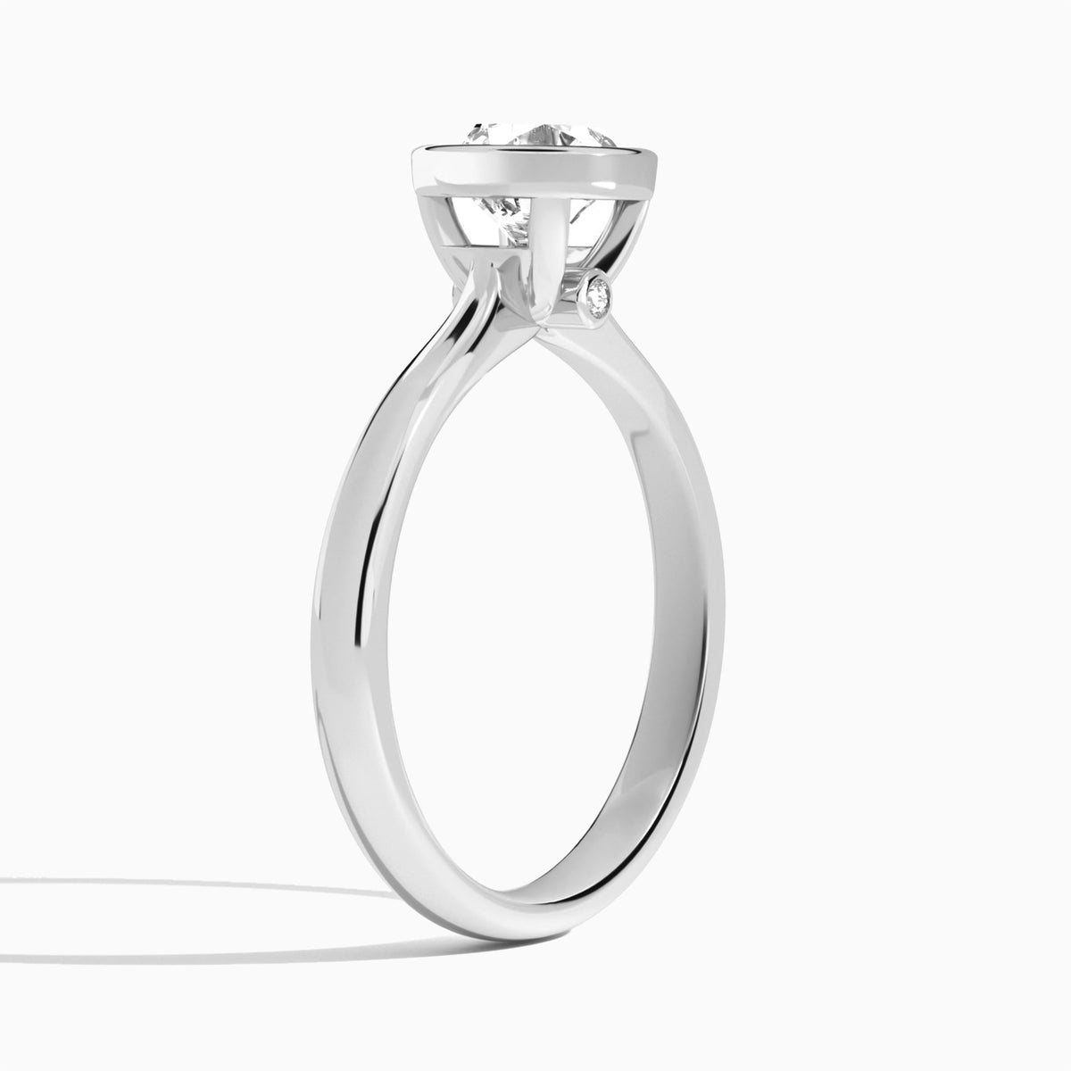 Round Classic Bezel Lab Grown Diamond Engagement Ring In 18K White Gold, Angle View