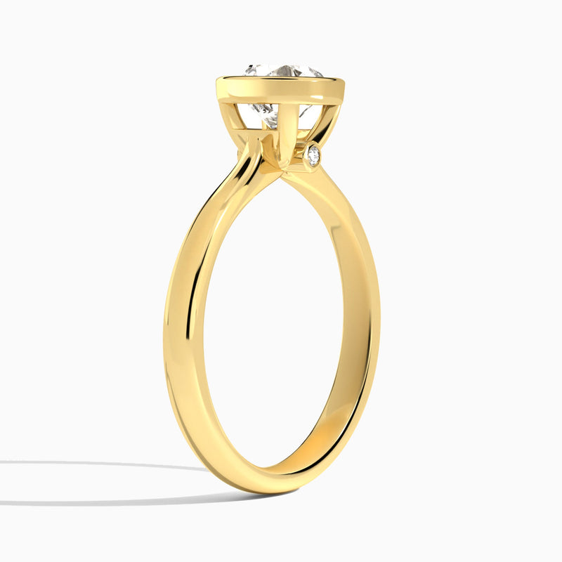 Round Classic Bezel Lab Diamond Engagement Ring In 18K Yellow Gold, Angle View