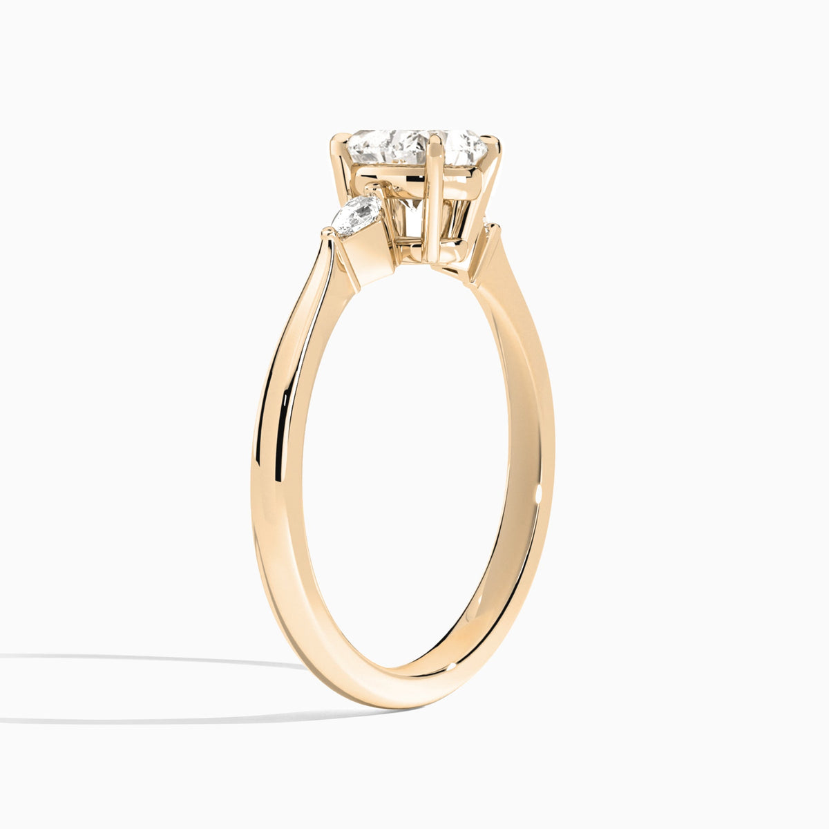 Heart Three Stone Lab Diamond Engagement Ring In 14K Rose Gold, Angle View