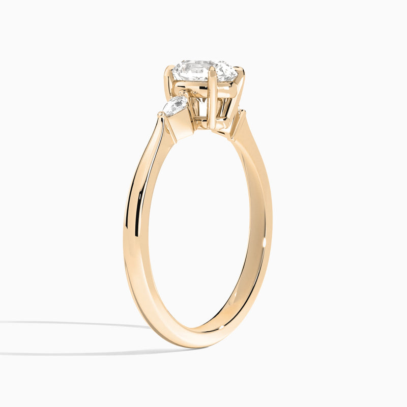 Round Three Stone Lab Diamond Engagement Ring In 14K Rose Gold, Angle View