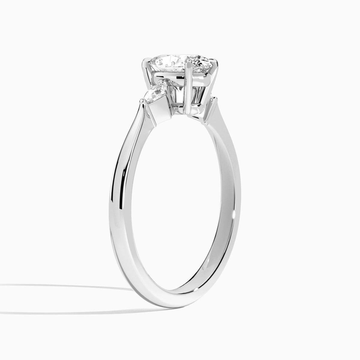 Oval Three Stone Lab Diamond Engagement Ring In 18K White Gold, Angle View