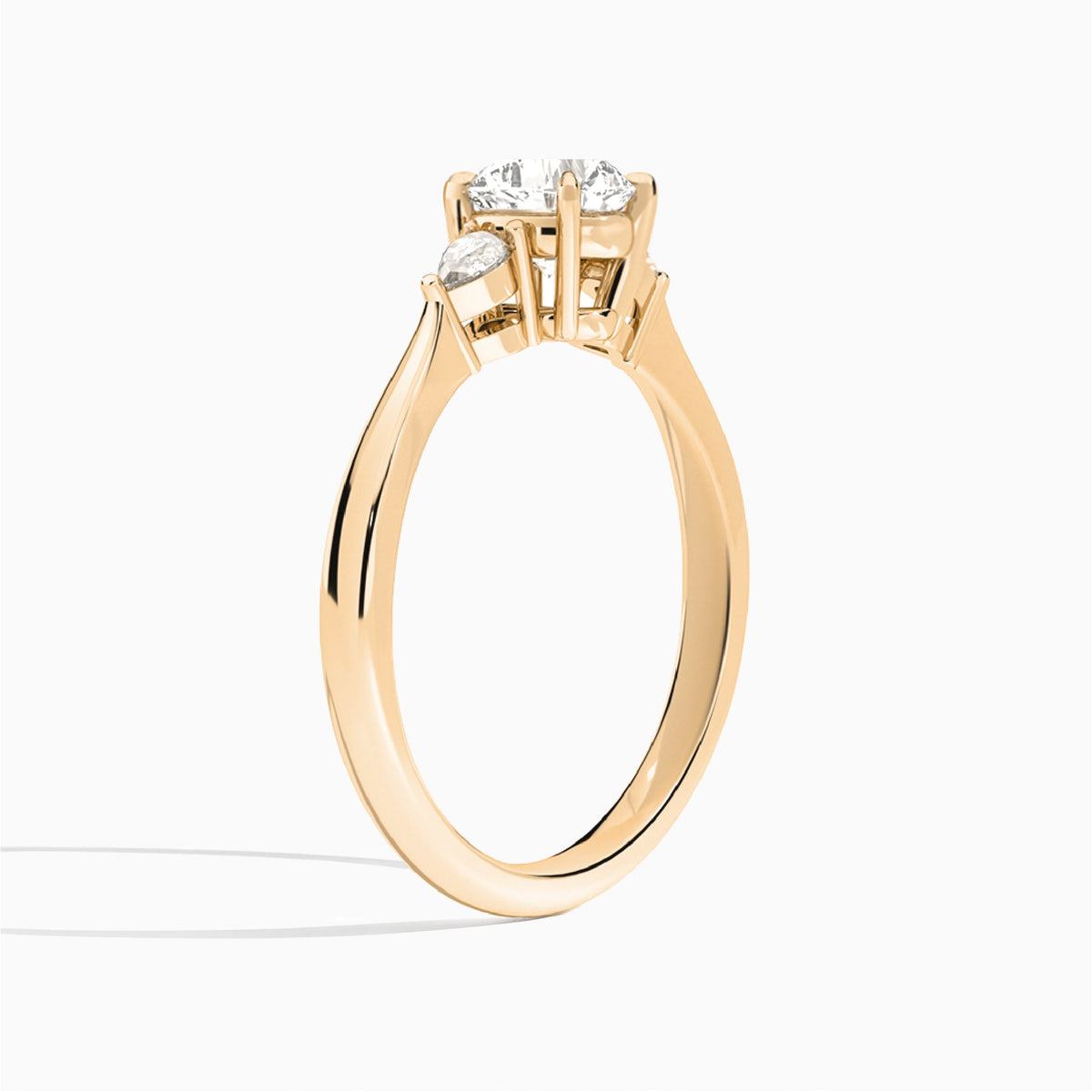 Cushion Couture Three Stone Lab Diamond Engagement Ring In 14K Rose Gold, Angle View