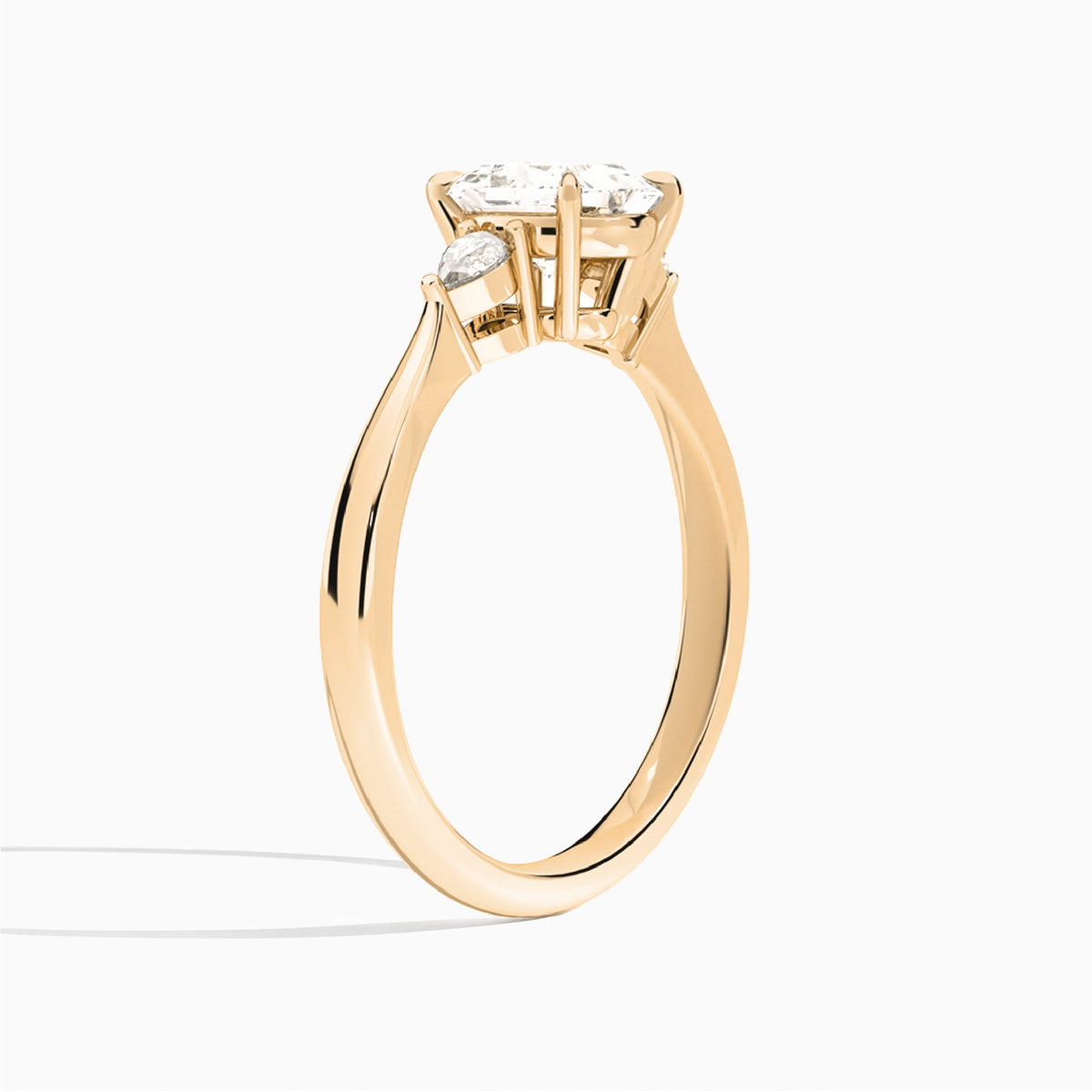 Princess Couture Three Stone Lab Diamond Engagement Ring In 14K Rose Gold, Angle View