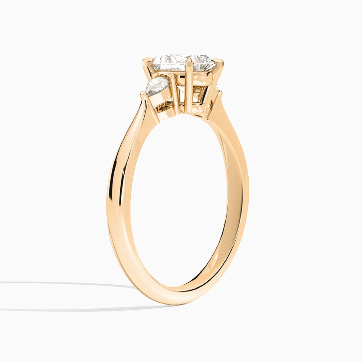 Radiant Couture Three Stone Lab Diamond Engagement Ring In 14K Rose Gold, Angle View
