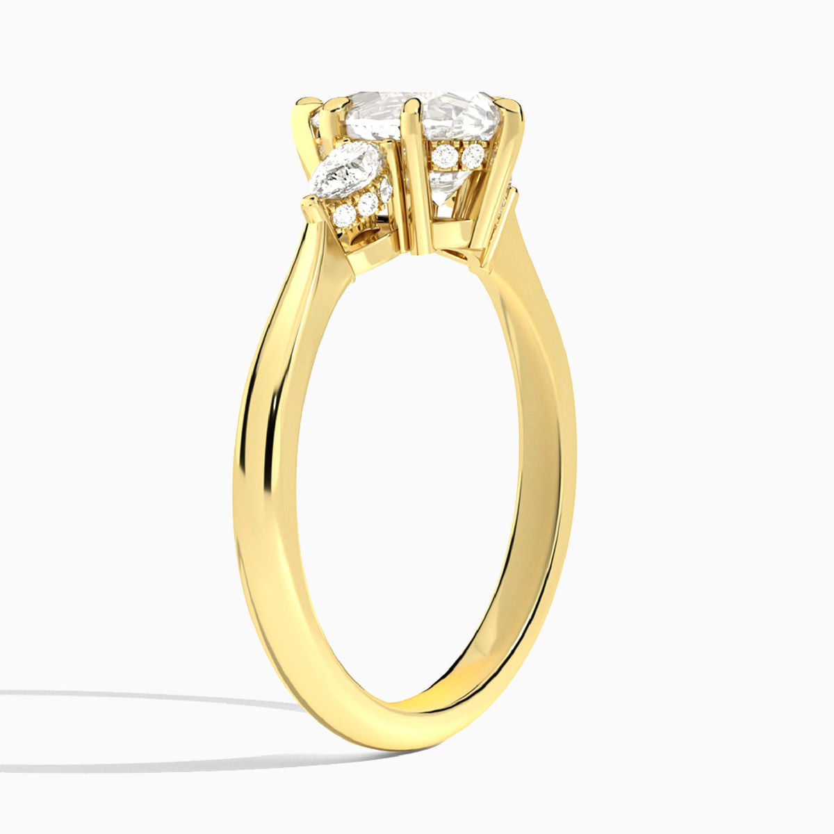 Pear Adorned Couture Three Stone Lab Diamond Engagement Ring In 18K Yellow Gold, Angle View