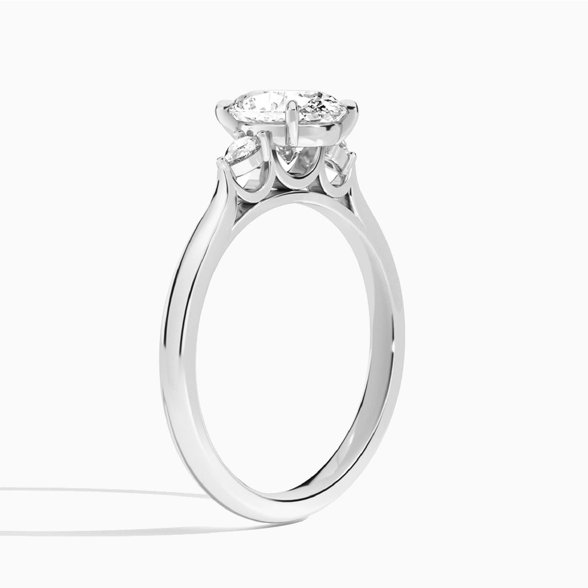 Oval Perfect Fit Three Stone Pear Lab Diamond Engagement Ring In Platinum, Angle View
