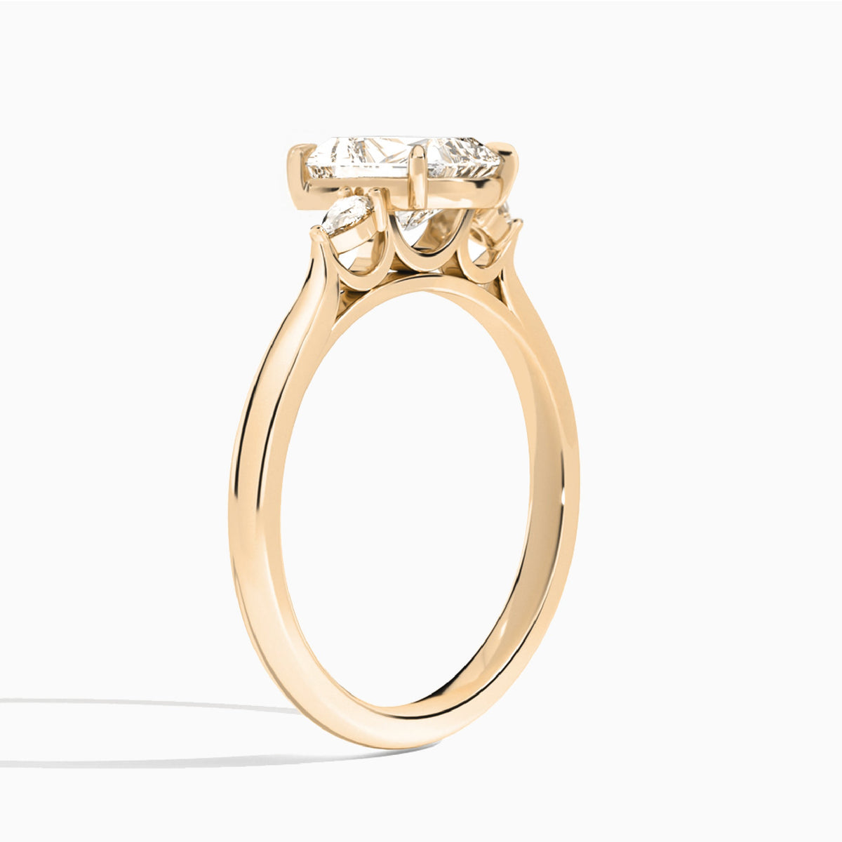 Radiant Perfect Fit Three Stone Lab Diamond Engagement Ring In 14K Rose Gold, Angle View