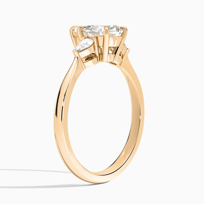 Pear Petite Three Stone Lab Diamond Engagement Ring In 14K Rose Gold, Angle View
